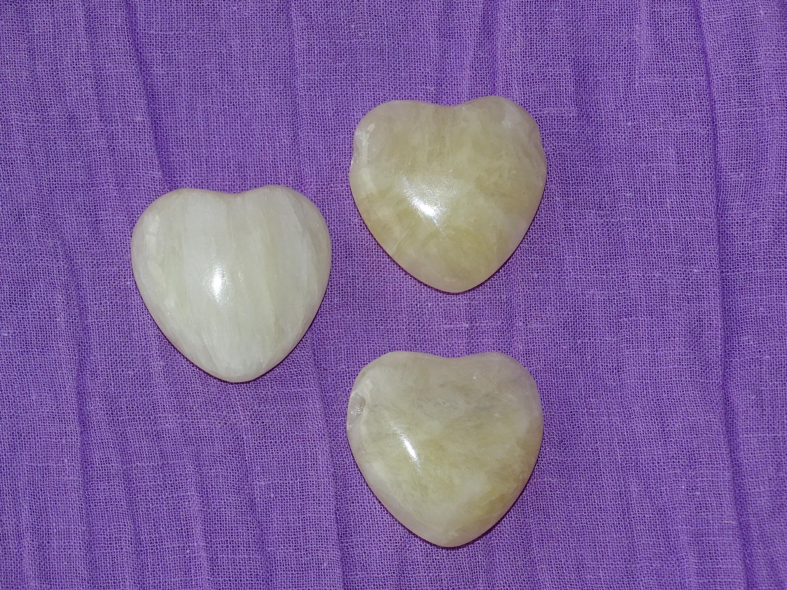 Orangencalcit-Herz (gebohrt)