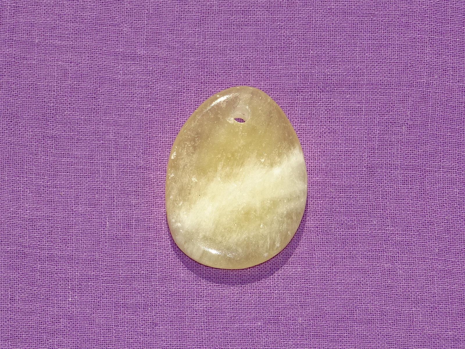 Orangencalcit gebohrt Nr. 1